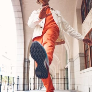 Fashion, model and gen z man from Spain with neon, trendy and luxury brand clothes. Clothing brand